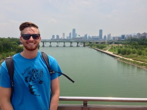 Alex with the Seoul Skyline as we hiked the river.