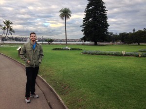 Alex walking through Sydney's Botanical gardens.