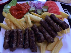 A popular food in the area, ćevapčići.  It is essentially skinless sausages served with bread an paprika sauce. It is great.