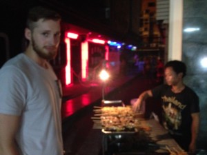Alex and I in a not so great neighborhood, Bangkok.  But yummy street food is yummy wherever.